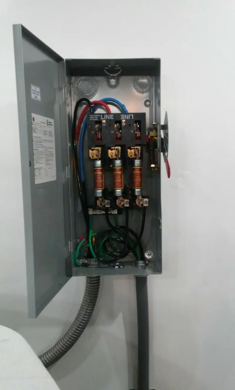 Three-phase disconnect switch installed for Smoke Detector Installation in Burke