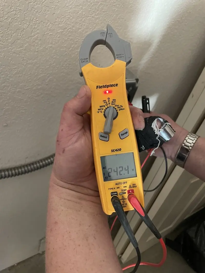 Voltage testing with clamp meter during Generator Installation in Burke